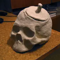 Clay skull on